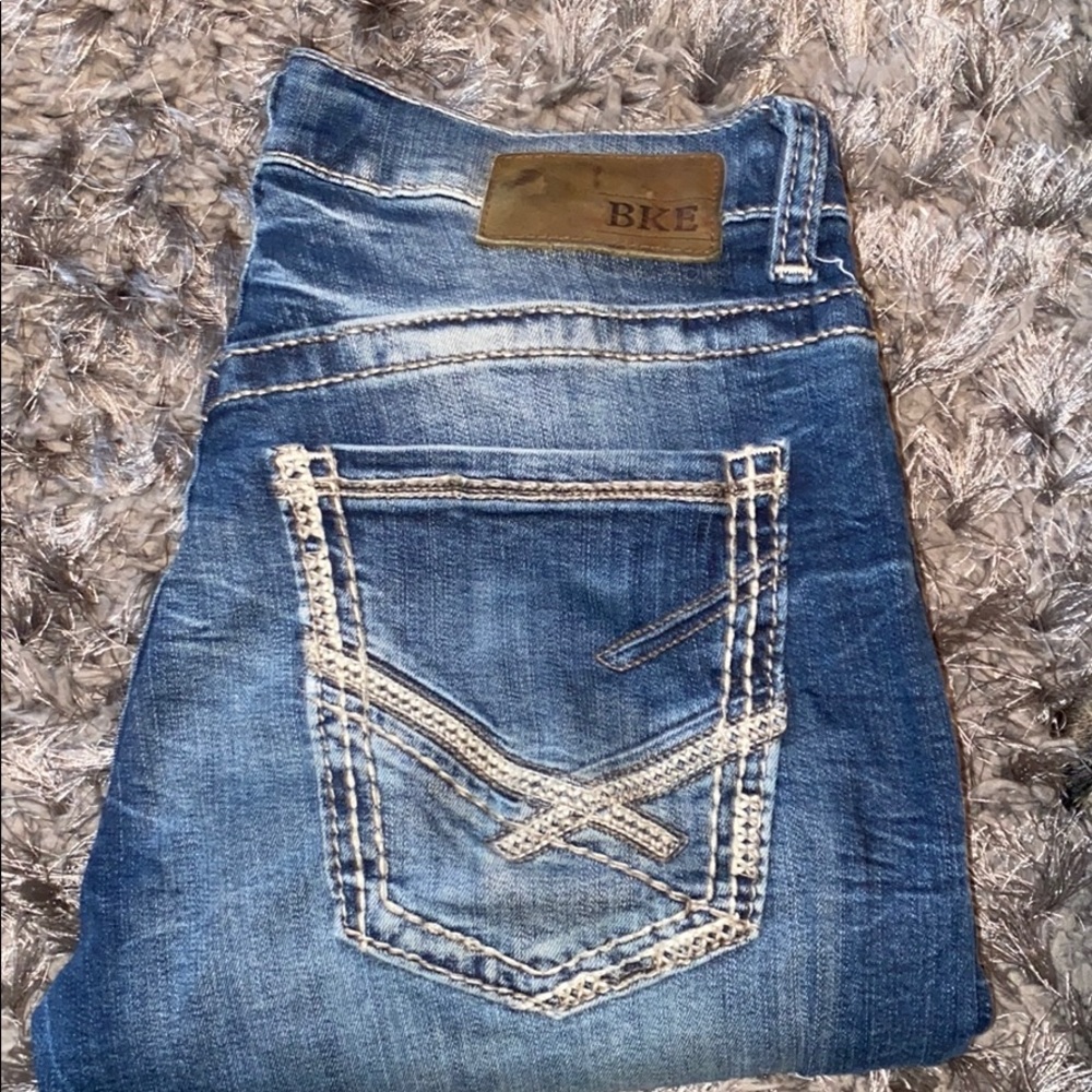 Men’s buckle jeans